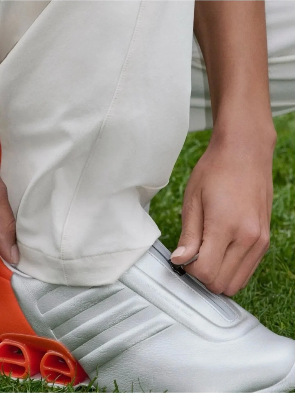 Men's Silver Athletic Sneakers with Orange Accent